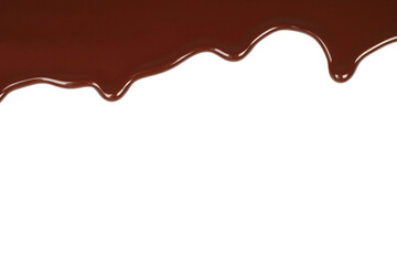 Melted chocolate dripping on white background .