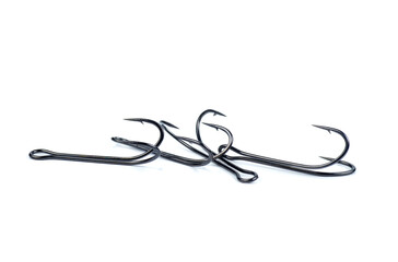 Hooks for professional spinning fishers isolated on white.