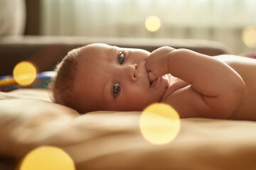 Unsecured little baby feeling uncomfortable without adult attention