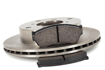 Ventilated car brake disc and pads, isolated on white background, isolated on white background