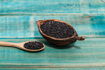 Black organic seeds of sesame - Sesamum indicum.
