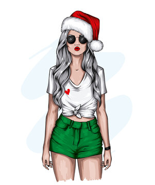 Beautiful girl in a Christmas hat and stylish clothes. Fashion and style, clothing and accessories. New Year's and Christmas.