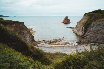 Wild hidden beach on the coast of Basque Country