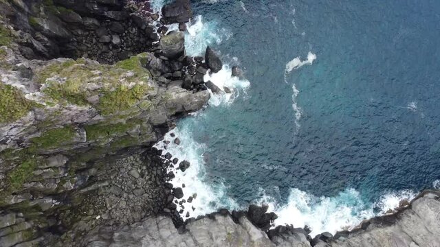 Aerial movie, rocky coast, cliffs seen from above, Atlantic Ocean, Azores islands, Sao Miguel
