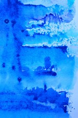 Blue abstract watercolor background. Blurred lines and spots. Background for laptop cover, book cover, notepad.