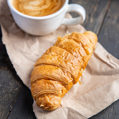 croissant and coffee hot drink fresh meal snack on the table copy space food background rustic. top view