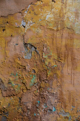 Grunge wall of the old house. Texture, background. Cracked concrete vintage wall