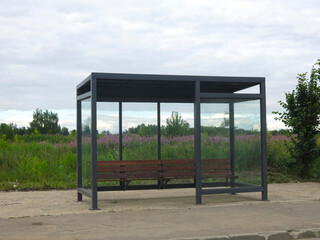 bus stop pavilion in the village with a bench without an urn