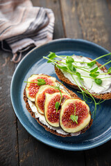 fig sandwich breakfast healthy diet fresh meal snack on the table copy space food background rustic. top view veggie vegan or vegetarian food