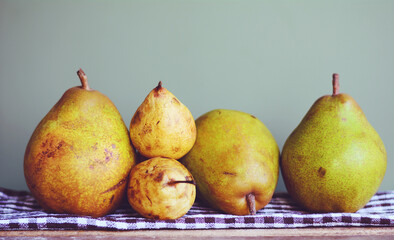 Organic Pears on a Green Backgound
