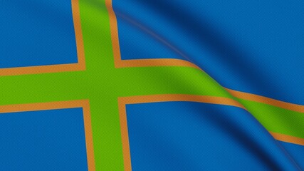 Flag with a green Nordic cross outlined in orange on a blue background, waving in the wind