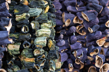 Assortment of dried eggplant and zucchini at farmers market.