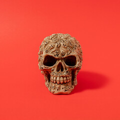 Halloween skull with shadows against bold red background. modern abstract art. modern concept. minimalism.