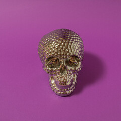 Halloween skull with shadows against bold purple background. modern abstract art. modern concept. minimalism.