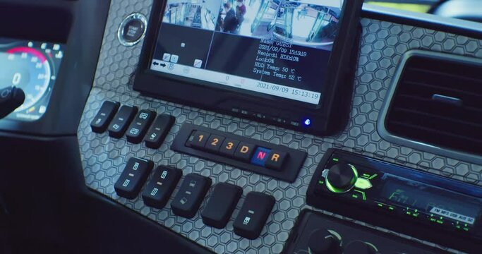 digital dashboard with analog buttons of a modern truck.close-up