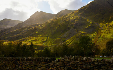 Foothills of Snowdon splashed by sunlight