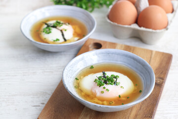 Bowls of traditional Japanese hot spring egg (Onsen Tamago) method of boiling eggs in the hot springs of Japan. Taste like soft custard, mostly famous during summer 