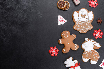 Christmas festive gingerbread made at home on a dark table