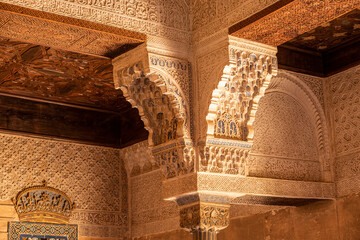 Detail of moorish ornaments in the Mexuar hall, part of the Nasrid palaces, Alhambra de Granada UNESCO World Heritage Site, Granada, Andalusia, Spain
