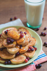 pancakes with berries and honey