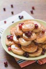 pancakes with berries and honey