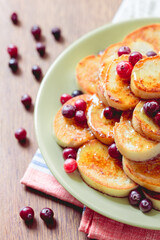 pancakes with berries and honey