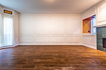Empty living room with hardwood floors