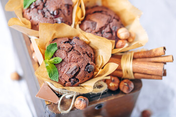 chocolate cupcakes, cinnamon and nuts