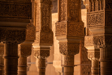 Arches and columns decorated with moorish ornaments at the Palace of the Lions (Palacio de los...