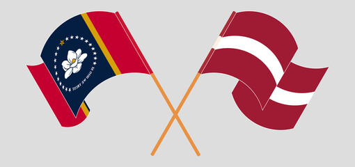 Crossed and waving flags of The State of Mississippi and Latvia
