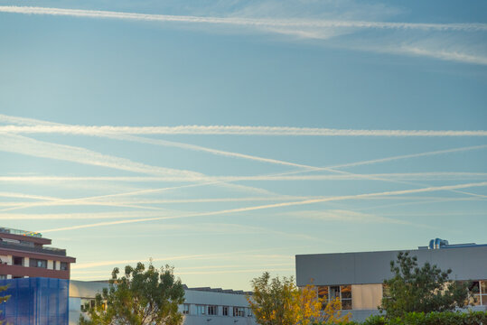urban chemtrails on a blue sky