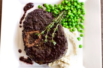 Sous Vide Beef Shank Steak with Red Wine Reduction and Sweet Peas