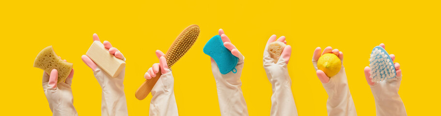eco friendly cleaning tools set on yellow background banner