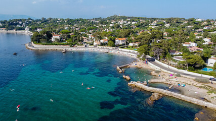 Aerial view of Ondes Beach on the Cap d'Antibes in the French Riviera - Ruins of a flooded round...
