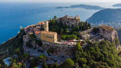 Aerial view of Eze Village, a famous stone village built on a rocky overlook high above the...
