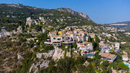 Fototapeta na wymiar Aerial view of Eze Village, a famous stone village built on a rocky overlook high above the Mediterranean Sea on the French Riviera, in the South of France