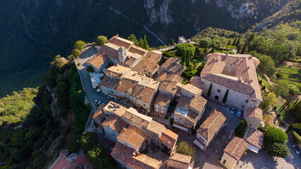 Aerial view of the medieval village of Gourdon in Provence, France - Stone houses built on the edge...