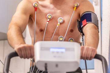 Close-up of electrodes on a man while an exercise ECG
