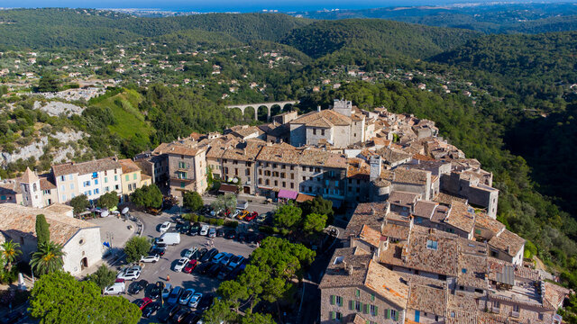 Aerial view of the medieval village of Tourrettes sur Loup in the mountains above Nice on the French Riviera, France - Old stone houses nestled on a belvedere in Provence