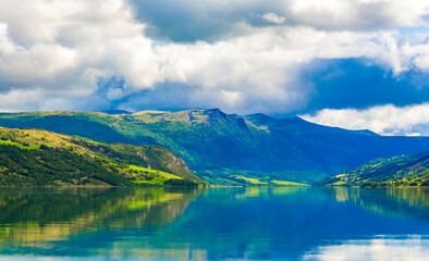 Naklejka na ściany i meble Incredible norwegian landscape colorful mountains fjord forests Jotunheimen Norway.