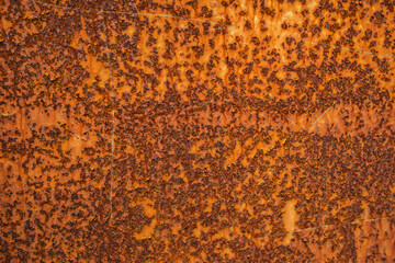 Rusty vintage metal background texture - iron old rust grunge steel metallic dirty brown wall.