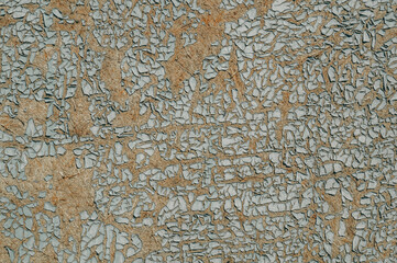 Solid board with old peeling paint. The texture of peeling paint. Background