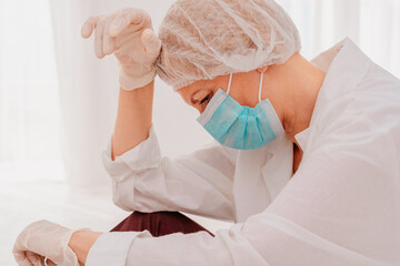 doctor is tired and stressed due to covid-19 virus pandemic