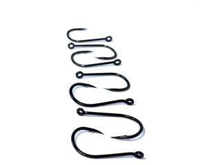 fish hooks for catching carp on a white background