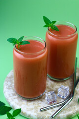 Jus Jambu Biji Merah or Guava Juice on isolated background. Selective focus.