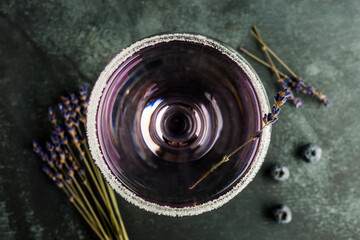 Purple soft lavender cocktail on the rustic background. Selective focus. Shallow depth of field.