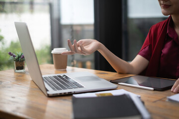 Fund managers researching and analysis Investment stock market by laptop computer. financial concept.