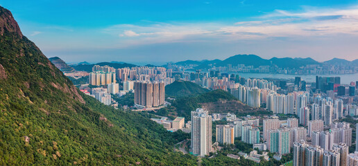 cityscape of Hong Kong, near the iconic Lion Rock Mountain