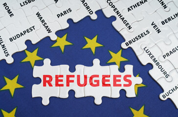 The EU flag has city name puzzles and puzzles with the words - refugees