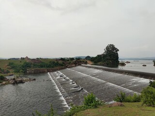 View of the Indian Dam overflowing with water.